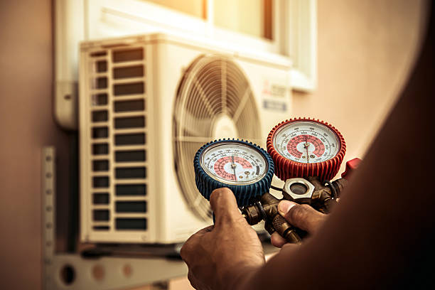 Professional Heat Pump Repair technician working in Hayti, MO